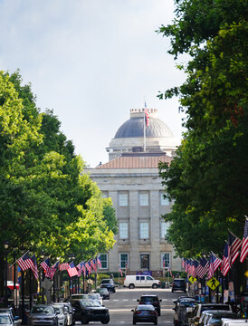 View of Fayetteville Street in downtown Raleigh with the North Carolina State Capitol building in the distance
