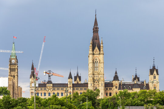 Parliament of Canada West Block and Centre Block with construction cranes. Canadian government building renovation