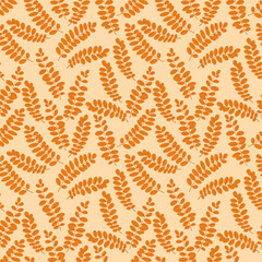 Obraz premium Seamless autumn pattern with orange acacia leaves on a yellow background. Vector illustration.