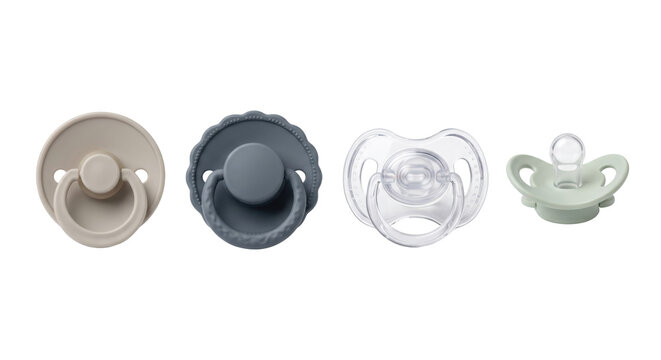 Four baby pacifiers in different styles isolated on transparent background