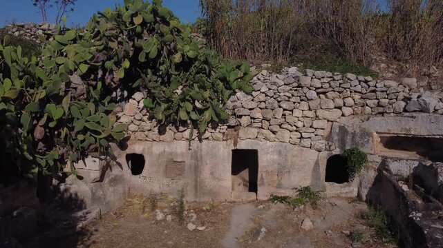 Salina, Malta - The entrance to the Salina Catacombs believed to be dated to the 2nd or 3rd century AD. High quality 4k footage