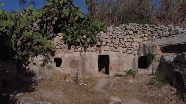 Salina, Malta - The entrance to the Salina Catacombs believed to be dated to the 2nd or 3rd century AD. High quality 4k footage