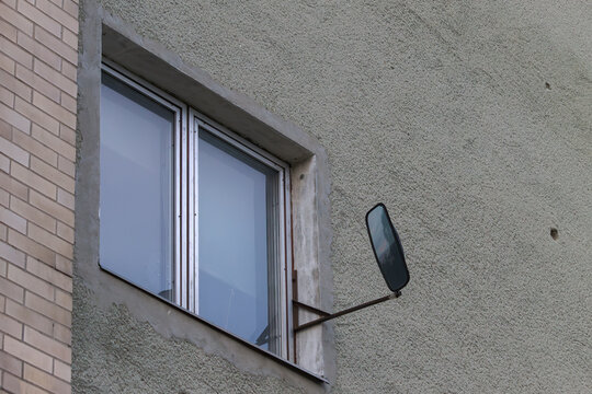 Mirror on a window as a security feature