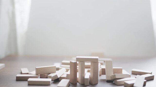 Miniature Wooden House Collapsing in Earthquake Simulation
