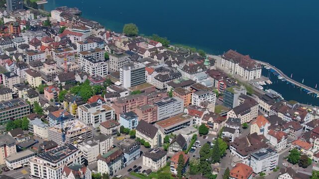 Aerial panoramic view above the downtown beside the city Rorschach in Switzerland on a sunny summer noon. 