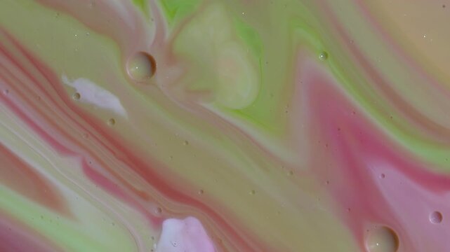 Abstract Fluid Art Macro - Swirling Chartreuse Green and Pastel Pink Paint Waves