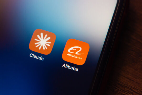Mexico City, MEXICO - Jul 7 2026 : Macro close-up of the Claude app icon by Anthropic beside the Alibaba icon.