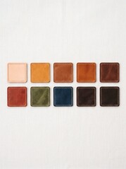 Fototapeta premium Colorful leather swatches arranged in grid on neutral background 