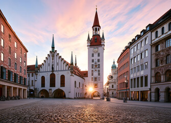 Fototapeta premium At sunrise, Munich and its Old Town Hall, including the tower, Bavaria, Germany - view of Marienplatz