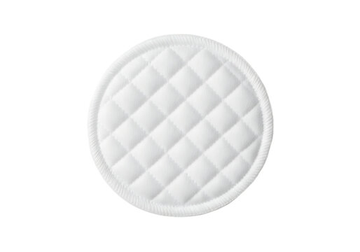 A round white quilted cotton pad for skincare and makeup removal, isolated on a white background, showing soft texture and stitched diamond pattern isolated on a transparent background