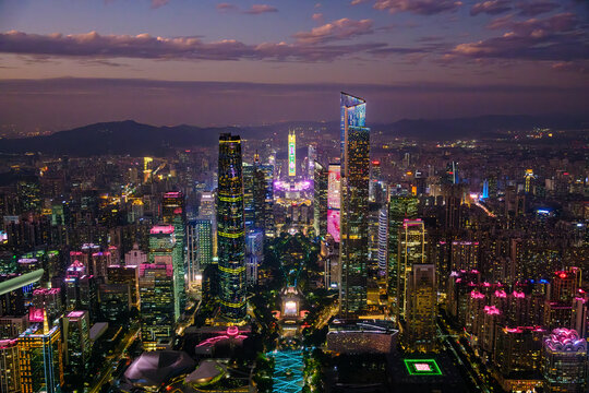 Aerial downtown cityscape of the financial district illuminated at night, Guangzhou, Guangdong Province, China