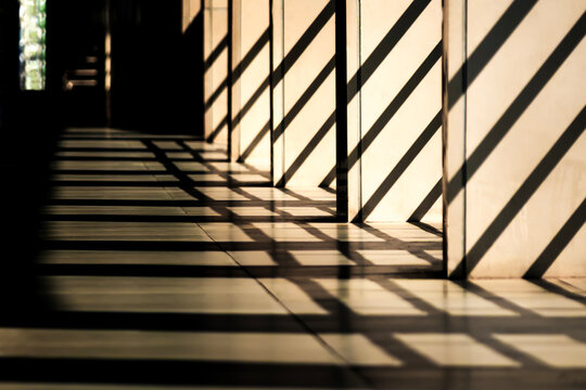 Shadows on a concrete corridor and walls