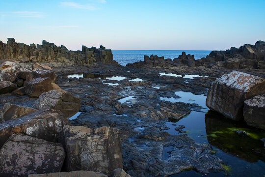 BOMBO STONES, KIAMA IN AUSTRALIA AT SUNSET