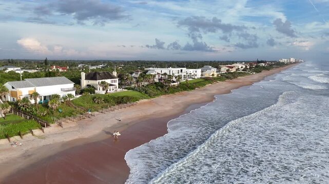 Beautiful morning with waves breaking along Ormond Beach in Volusia County, Florida