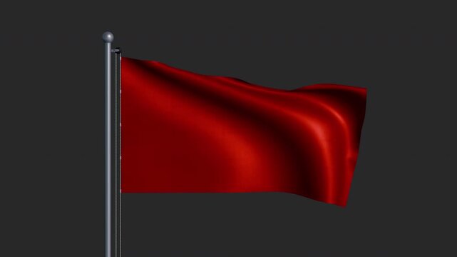 Front view of a red flag waving on a flagpole