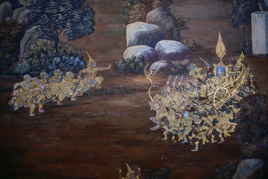 Battle scene between monkey army and giant demons on chariot, traditional Thai mural painting at Wat Phra Kaew, Bangkok, Thailand