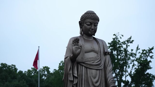 Lingshan Buddha Statue with Chinese flag behind