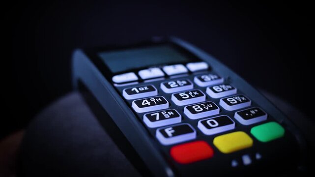 Credit Card Terminal With Hand Inserting Card 