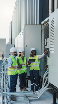 Engineers Inspecting AI Data Center Equipment