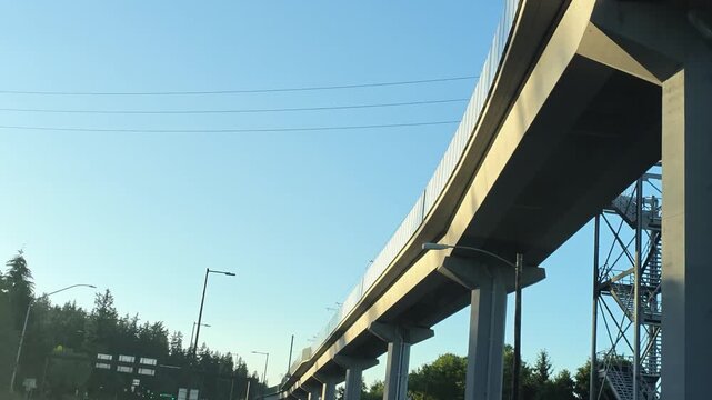 Low angle view of elevated concrete light rail guideway in Washington state