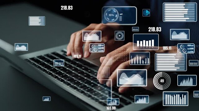 Hands are typing on a laptop amidst floating data visualizations, showcasing digital analytics and statistical information in a modern office setting. Xenic