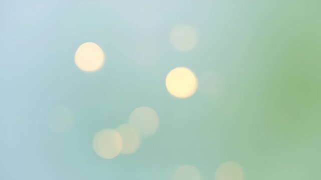 Abstract green bokeh background with soft light, pastel blur, glowing circles, calm airy texture, gentle decorative glow for SEO searchable visual backdrop