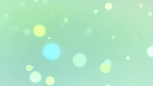 Abstract green bokeh light background with soft blur, glowing circle, calm airy glow and gentle soft light, blurred circles creating calm mood