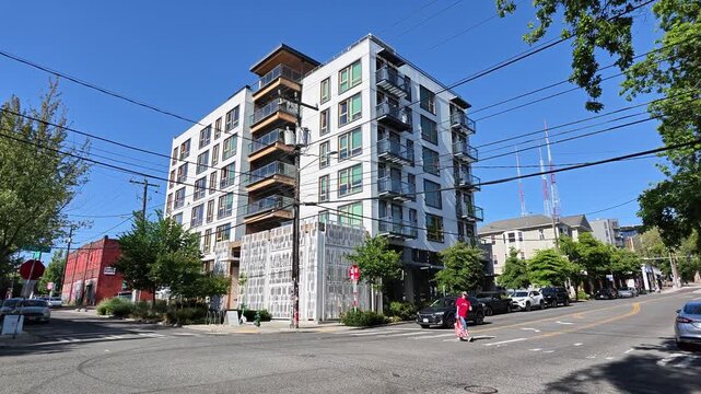 Modern apartment building on city street corner in Washington