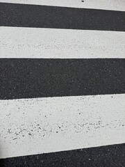 Fototapeta premium Crosswalk stripes on asphalt road, Tokyo