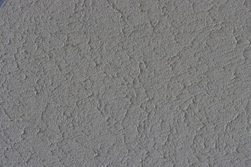 Fototapeta premium Close-up of an old, uneven concrete wall.
