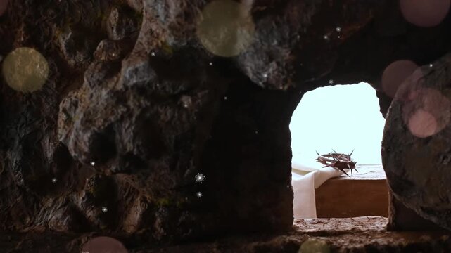 Dramatic cave entrance with two illuminated archways and bokeh effects revealing a serene landscape