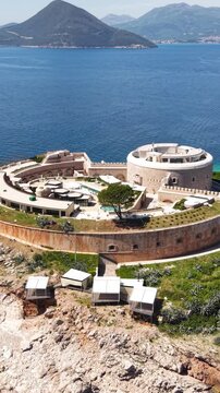 Mamula Island, Montenegro. Vertical Drone Shot of Former Fortress Now Luxury Hotel Resort