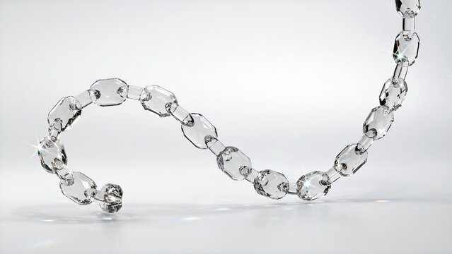 Clear crystal chain hanging with reflective surface and white background