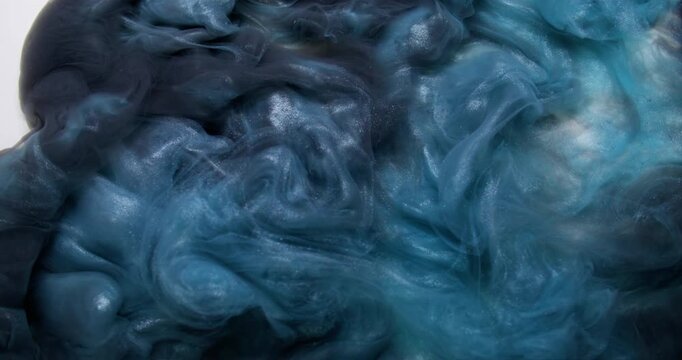 Dark haze. Cloud mix. Shimmering ink liquid smoke flow. Grunge stream abstract blue black pigment cosmic explosion on white background.