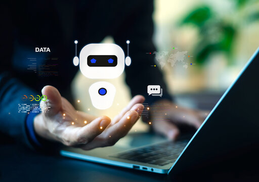 Business professional using AI chatbot interface on laptop for customer support, virtual assistant, automation, data analysis, digital communication, and smart business technology solutions.