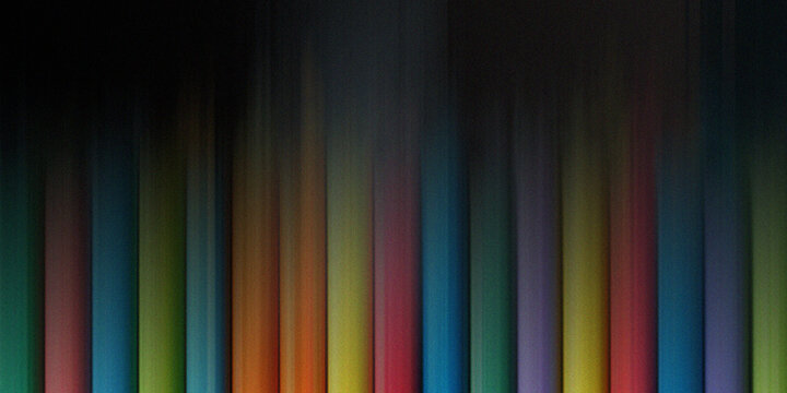 Abstract multicolored vertical lines showing vibrant rainbow streaks with subtle grain and motion blur light effect display.