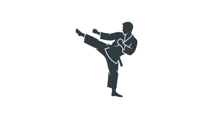 Man in karate uniform kicking high. © Bilal