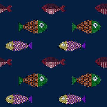 Seamless pattern with cute stylized fish in cross-stitch embroidery style on a navy blue background, folk art inspired design, colorful textile fabric print, vector illustration.