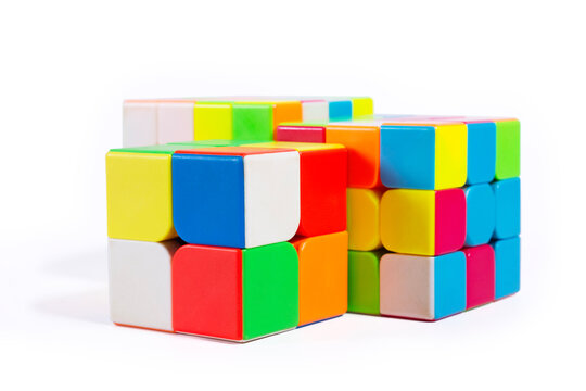 Bangkok Province, Thailand, 8 July 2026. Colorful 2x2, 3x3 and 4x4 Rubik's cubes isolated on a white background.
