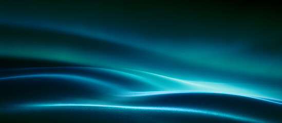 Fototapeta premium An ethereal background featuring grainy teal and blue waves against a dark backdrop, reminiscent of the aurora borealis. This abstract aesthetic is perfect for a futuristic wallpaper or design.