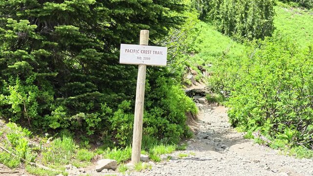 Pacific Crest Trail signpost on a mountain hiking path