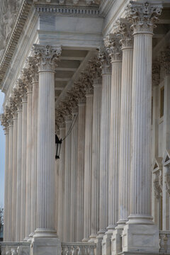 Columns marble repetition Tall vertical. Columns architectural symmetry layout. Columns decorative capitals ornament elements. Columns heritage neoclassical design.