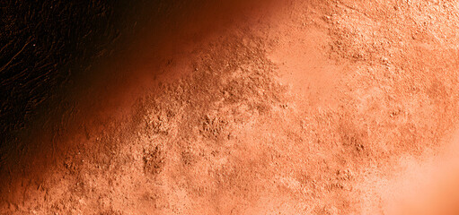 Fototapeta premium A terracotta background with a grainy texture and soft gradients, a warm copper blurred backdrop, earthy clay colored wallpaper with organic lighting and shading.