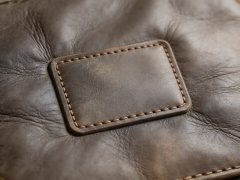 Closeup of leather patch with stitching