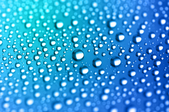 Abstract Blue Water Drops on Gradient Background