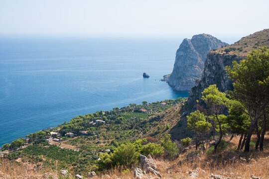 Panoramic view of Capo Zafferano rocky promontory from Monte Catalfano park in Sicily
