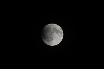 Detailed Full Moon Against Dark Night Sky with Visible Lunar Surface © sahed