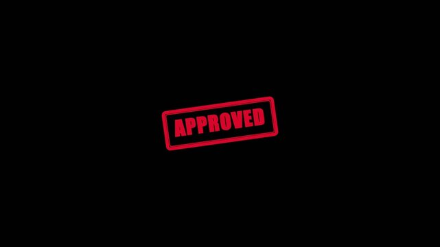 Approved red rubber stamp mark creates a bold visual motion animation effect on a plain dark black background video clip