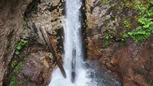 Flattach, Austria - June 12 2026: Raggaschlucht watterfalls and hiking trail. River Ragga. Drone footage. Drone flying over. Aerial footage. Following a bird flying over the river.