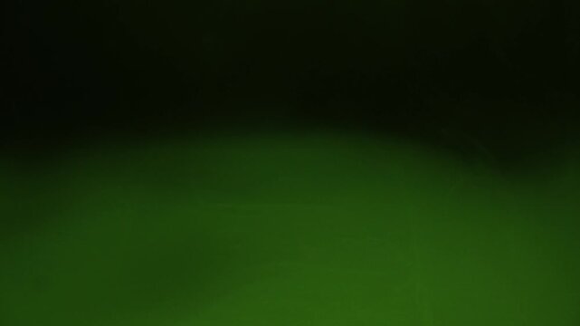 Abstract Green Smoke Swirls in Air Artistic Image